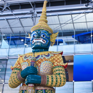 Statue of a giant guardian demon (Yaksha) in traditional Thai attire at Suvarnabhumi Airport in Bangkok, Thailand – a symbolic welcome for travellers arriving in the country. A striking image for Thailand travel blogs highlighting cultural landmarks and first impressions upon arrival.